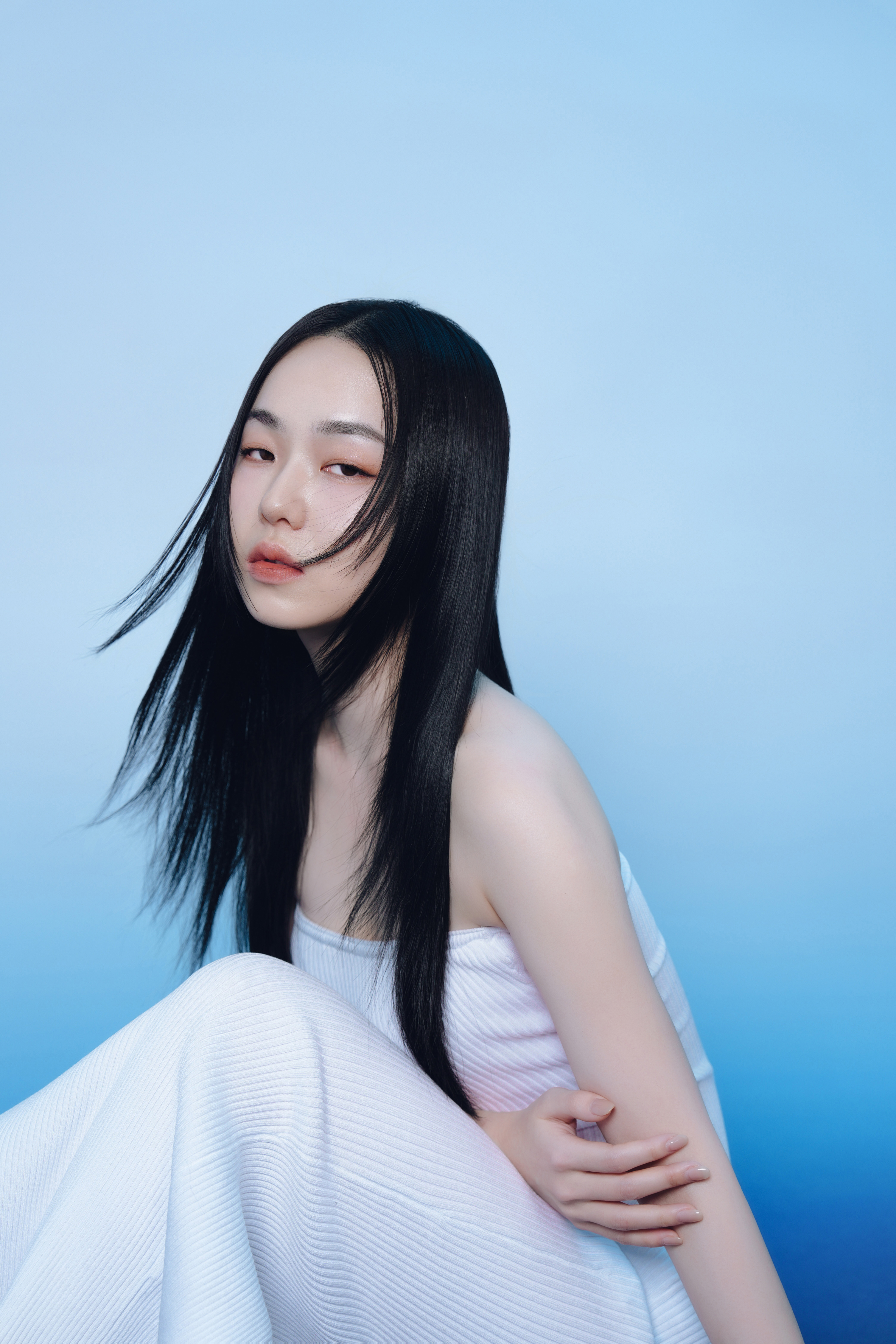 Professional portrait photography showcasing artistic lighting and composition